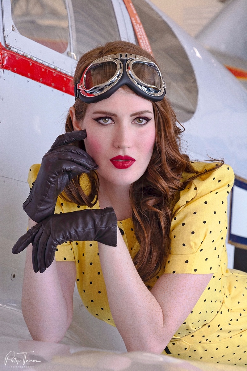 Male and Female model photo shoot of Northlight Studios and Christiana Raquelle in Oakland Air Museum