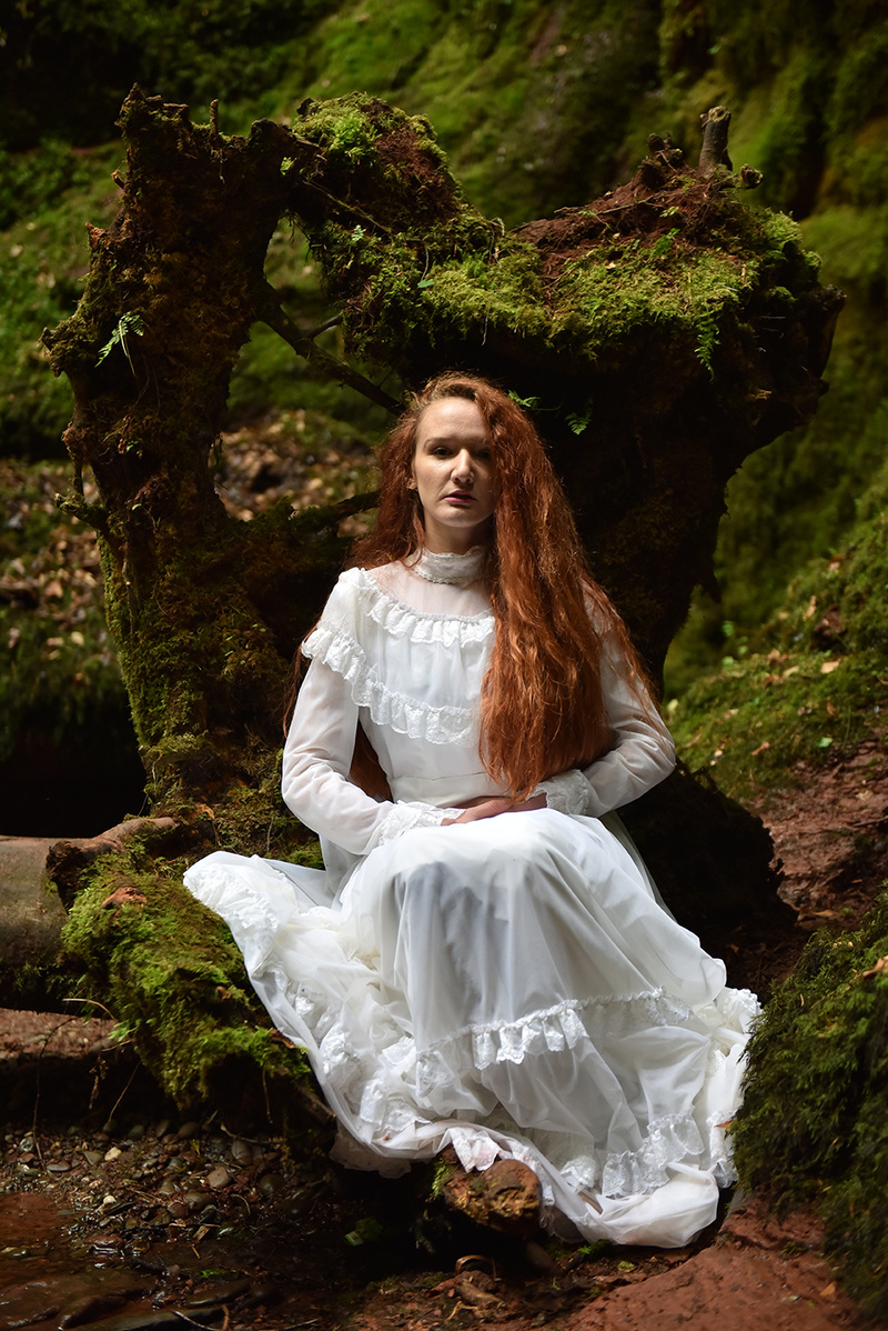 Female model photo shoot of Ana Maria AL in Devils pulpit Scotland