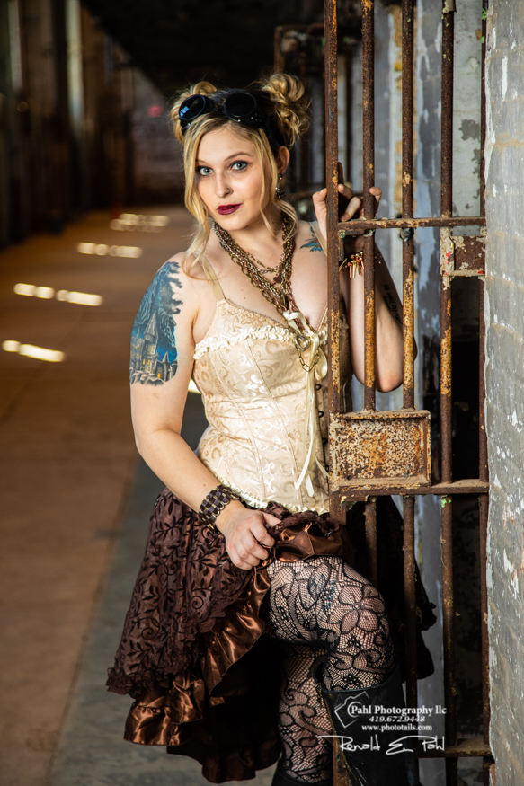 Male and Female model photo shoot of PhotoT Photography and Kassiegmodel in Ohio State Reformatory Mansfield