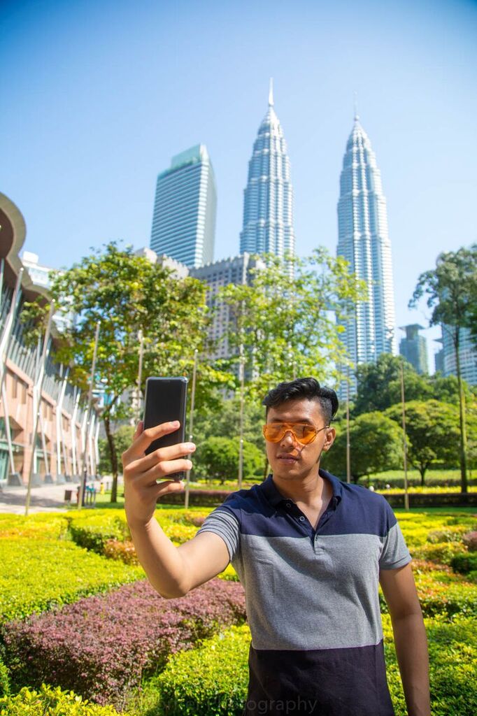 Male model photo shoot of Gandy Setiawan in KLCC, Bukit Bintang, Kuala Lumpur