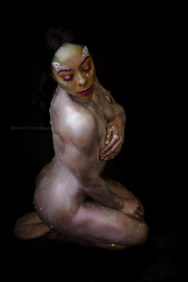 Female model photo shoot of Eyes of Venus Makeup by Bethanyephotog