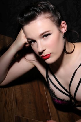 Female model photo shoot of Nicotine Cherry