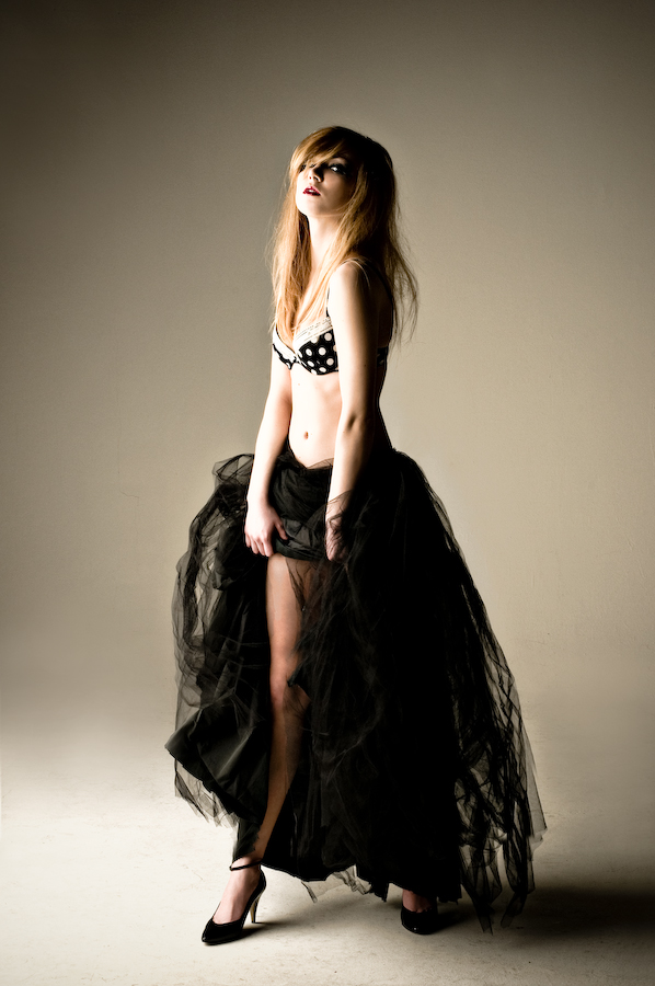 Female model photo shoot of Holly Q IKONIK Mag