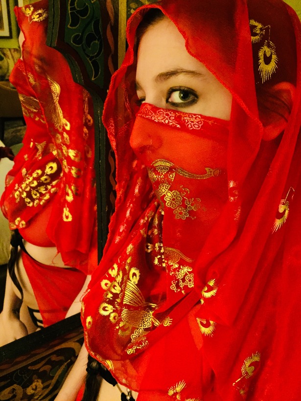 Female model photo shoot of veiled_kajira