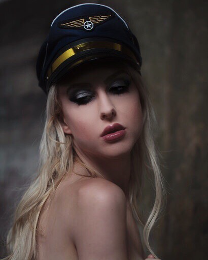 Female model photo shoot of RRRP by vanessapatton in Air France, makeup by saraellemua