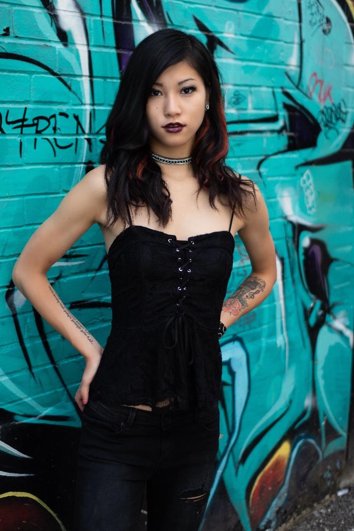Female model photo shoot of kelseyluo by Stefan Miller in Red Room Graffiti Alley