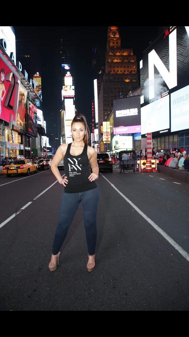 Female model photo shoot of Roseann P in Times Square