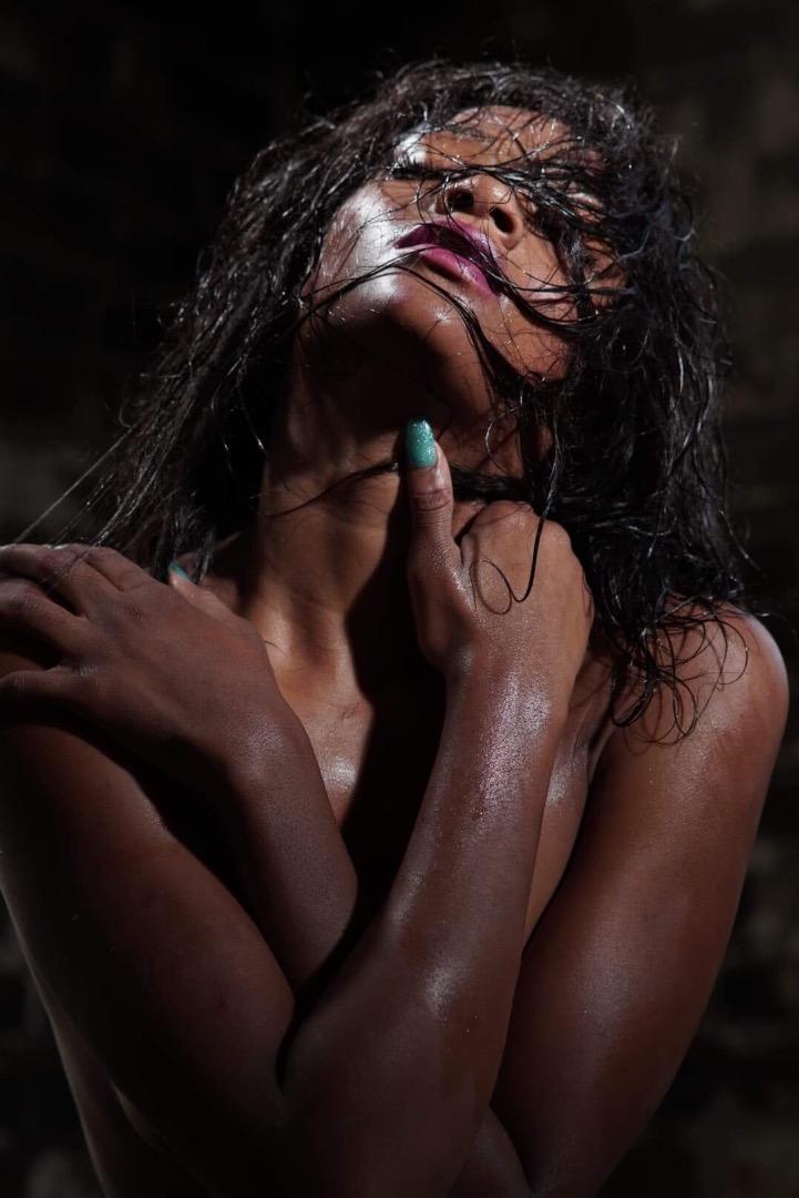Female model photo shoot of Jamaican Queen 