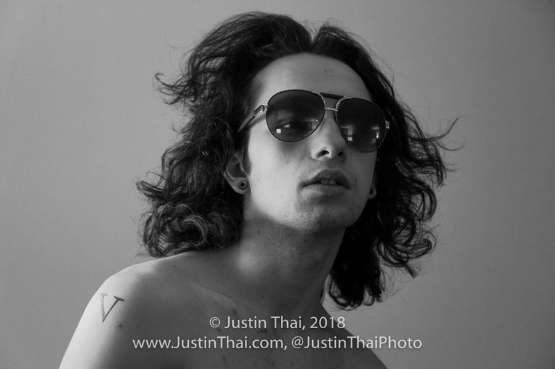 Male model photo shoot of JoeAg by Justin Thai in Hyatt Regency Denver