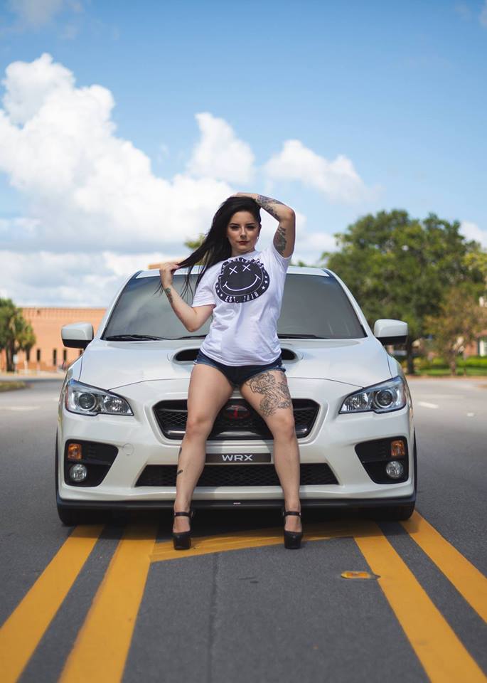 Female model photo shoot of bimmerbabeeee in Downtown Pensacola