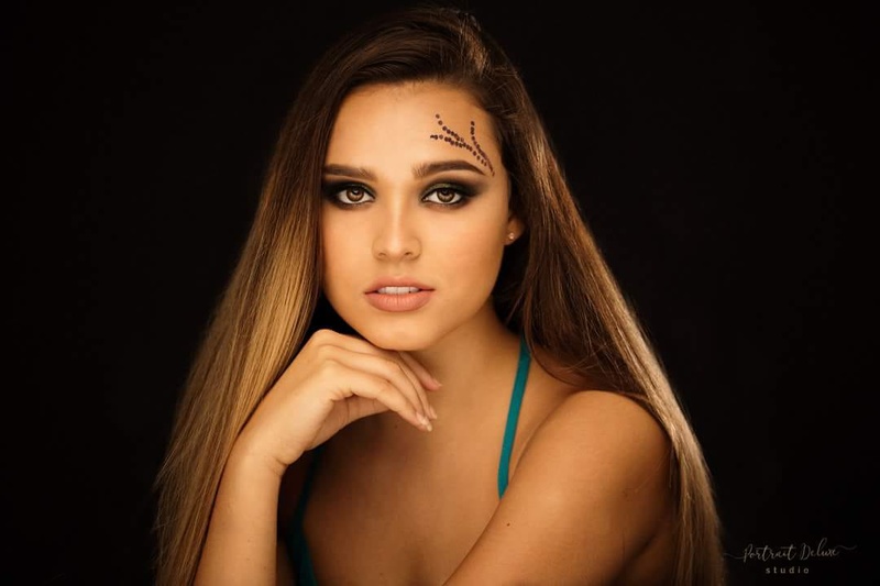 Female model photo shoot of Lovestory_makeup in Portrait Deluxe Studio