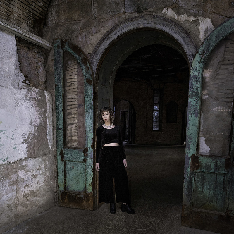 Female model photo shoot of rcarpenterphotography in Eastern State Penitentiary
