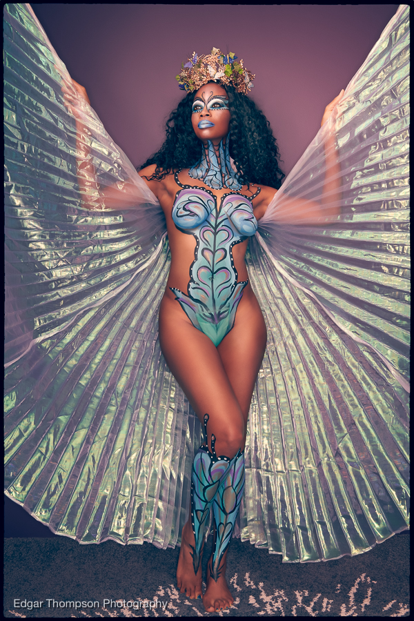 Female model photo shoot of Nimah Wynee by E Thompson Photography, body painted by A_Gray