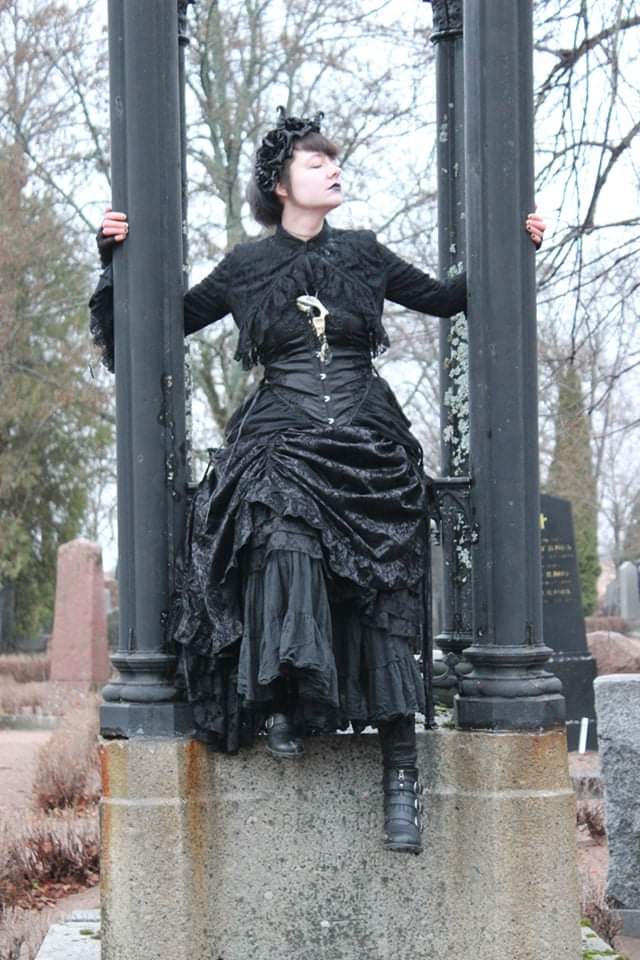 Female model photo shoot of Svartamadam13 in Uppsala Old Cemetery, Uppsala, Sweden