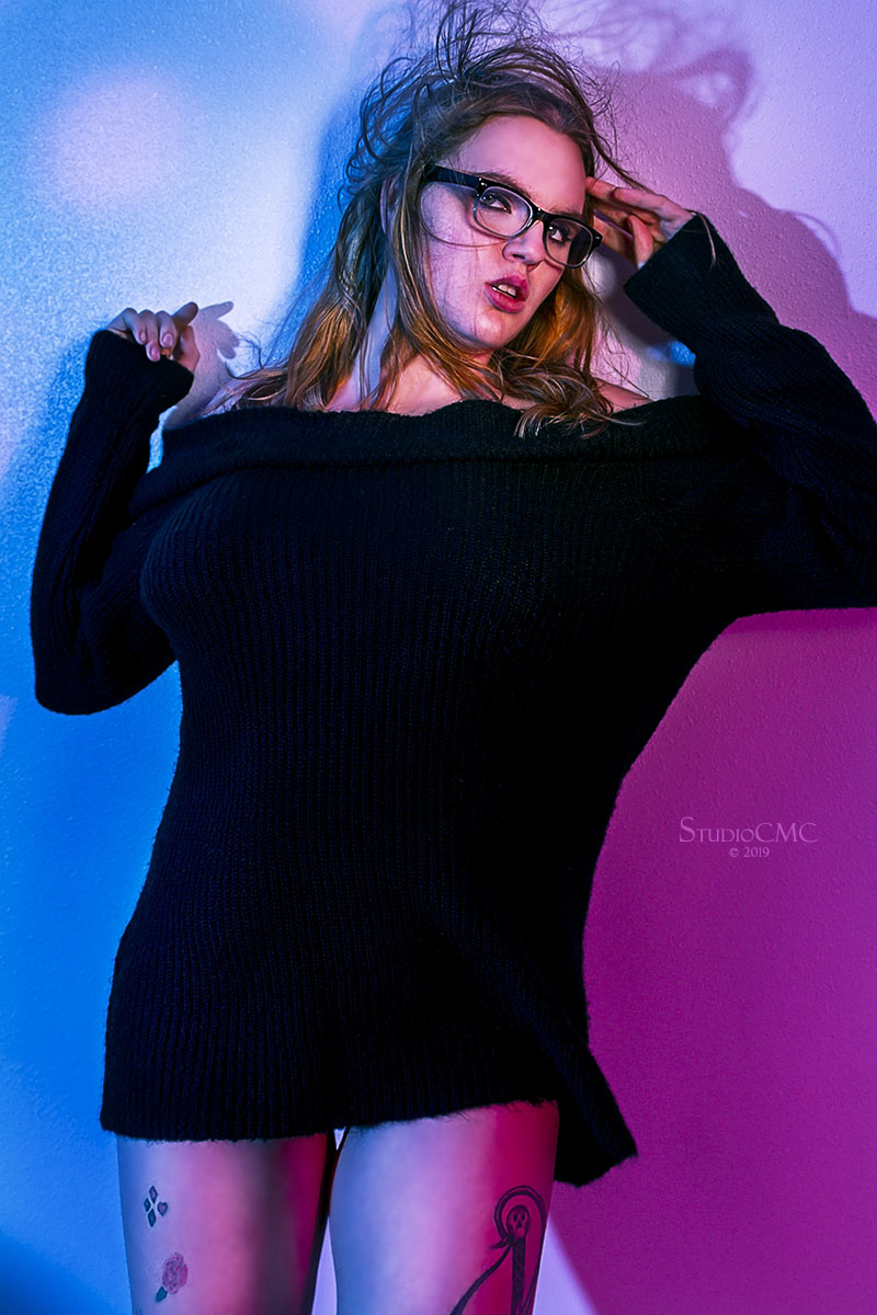 Female model photo shoot of dluxmod by StudioCMC
