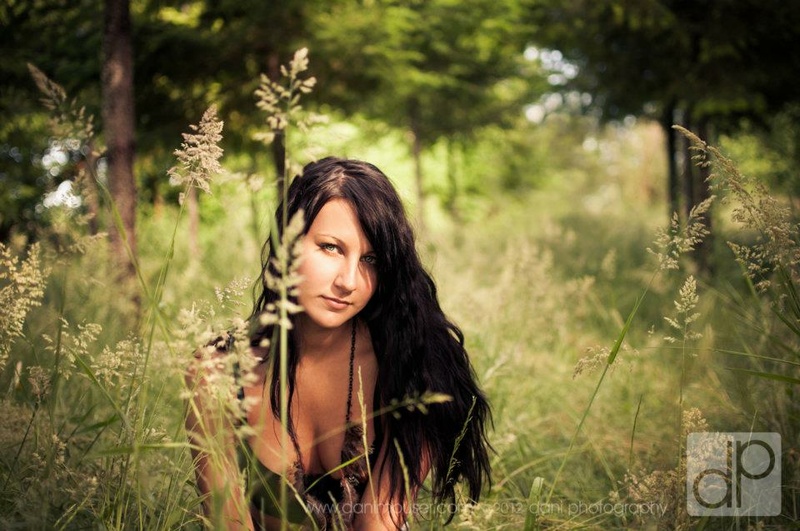 Female model photo shoot of Dani Benton Photography