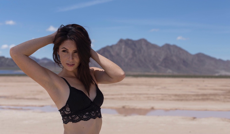 Female model photo shoot of Ashley wolf by CJH Photos in Dry lake bed outside Boulder City