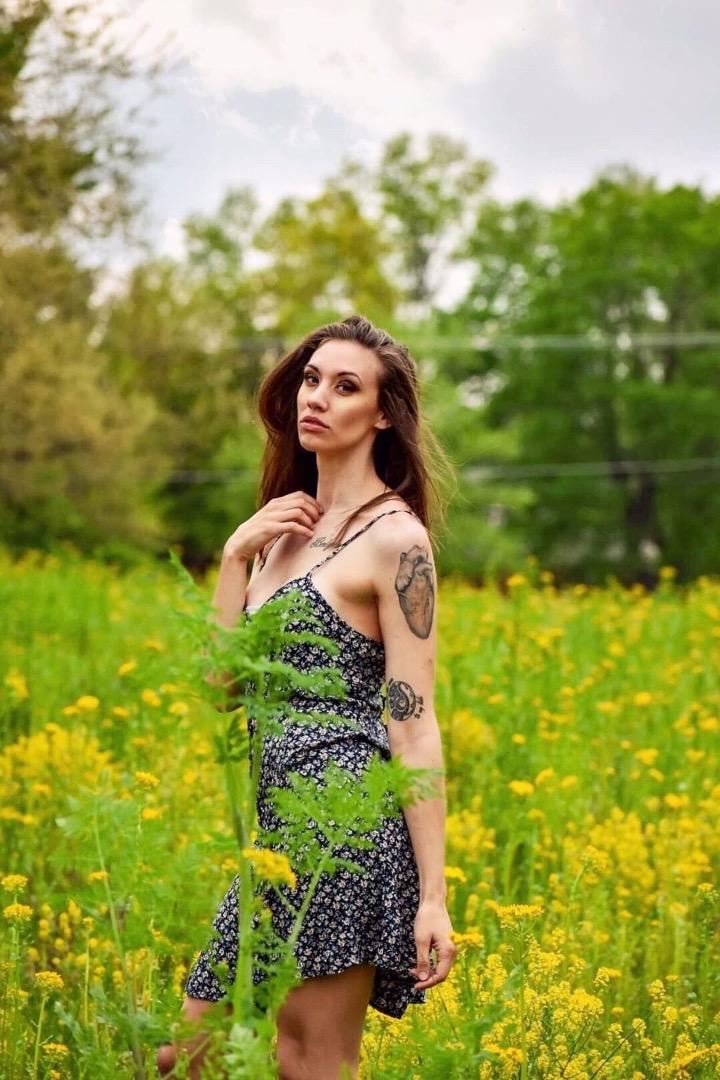 Female model photo shoot of Emily Adair
