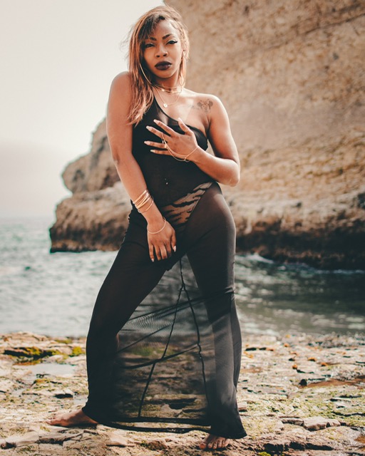 Female model photo shoot of Quneshab in Shark fin beach Davenport ca