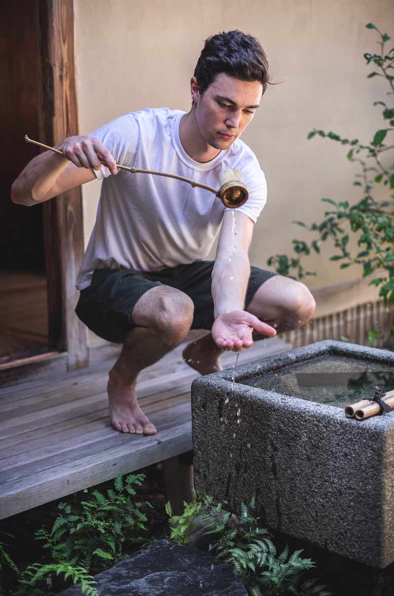 Male model photo shoot of Ryder White in Shofuso Garden