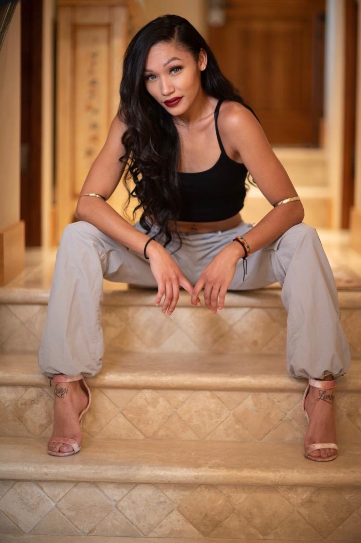 Female model photo shoot of Doja Li