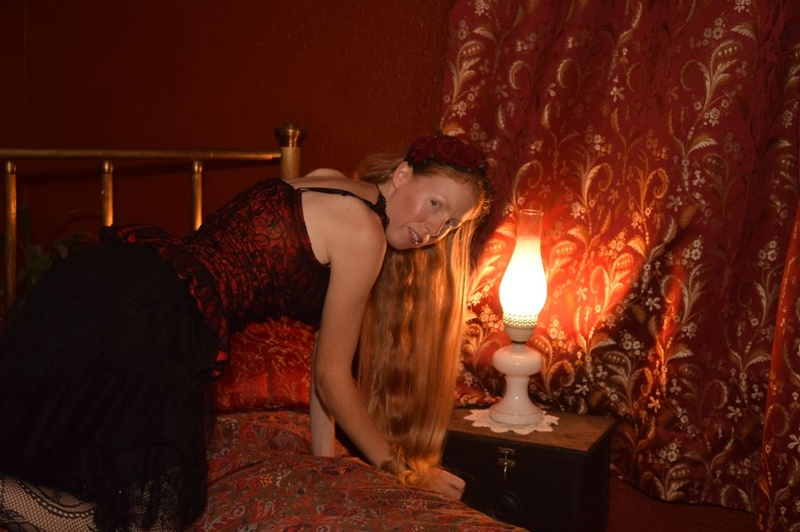 Female model photo shoot of Molly Nicole tymtravlr in haunted old hotel in Willamina, OR. It used to be an informal brothel