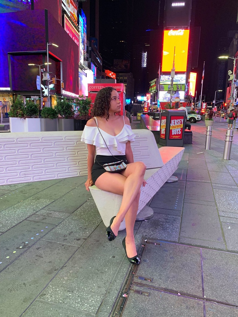 Female model photo shoot of Yeritza in Times Square