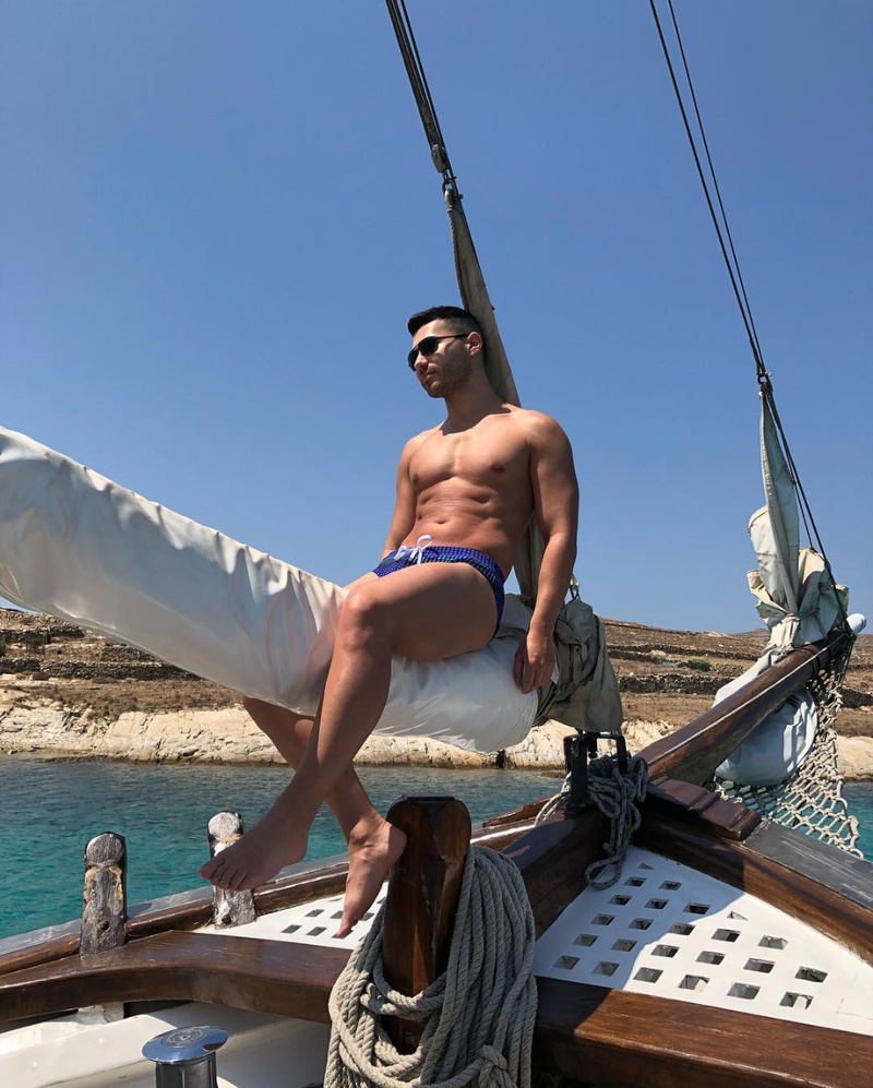 Male model photo shoot of Murat Ozyucekok in Mykonos