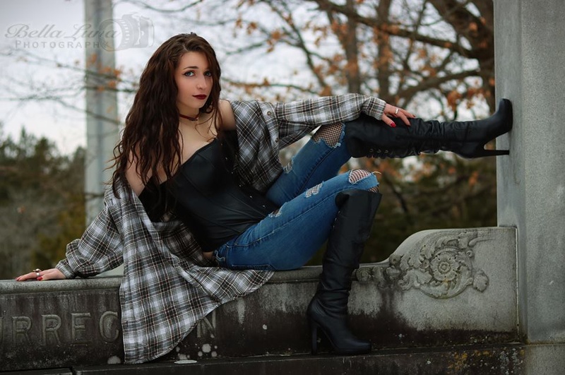 Female model photo shoot of Emmie April by Bella Luna Photography in Oakwood Cemetery