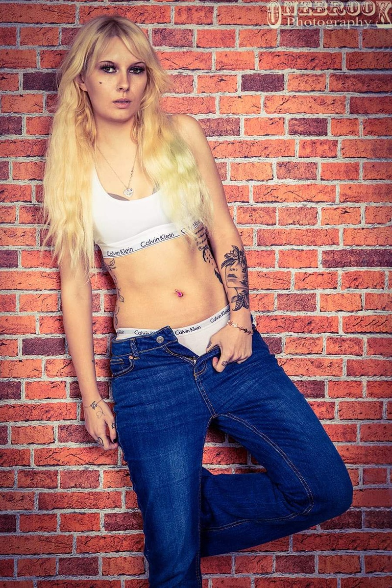 Female model photo shoot of blondebombdoll by MartynS in solo studio