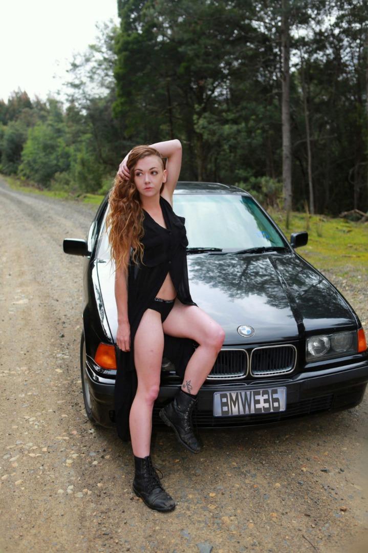 Female model photo shoot of Rainy Parade in Geeveston tasmania
