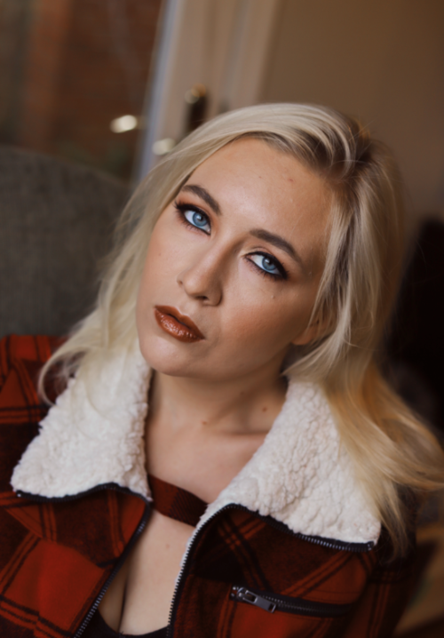 Female model photo shoot of Danielle Philips, makeup by kitsena