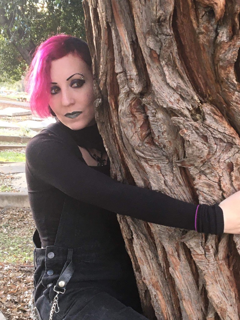 Female model photo shoot of TwistedWildOrchid  in cemetery 2020