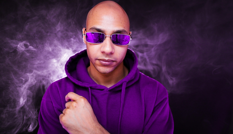 Male model photo shoot of Purple Man