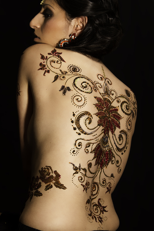Female model photo shoot of Michelle A by UCS, makeup by Joanna Cruz MUA, body painted by Henna Rung by Asha