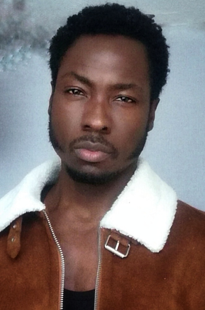 Male model photo shoot of Ola Sampson