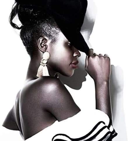 Female model photo shoot of NyakorT