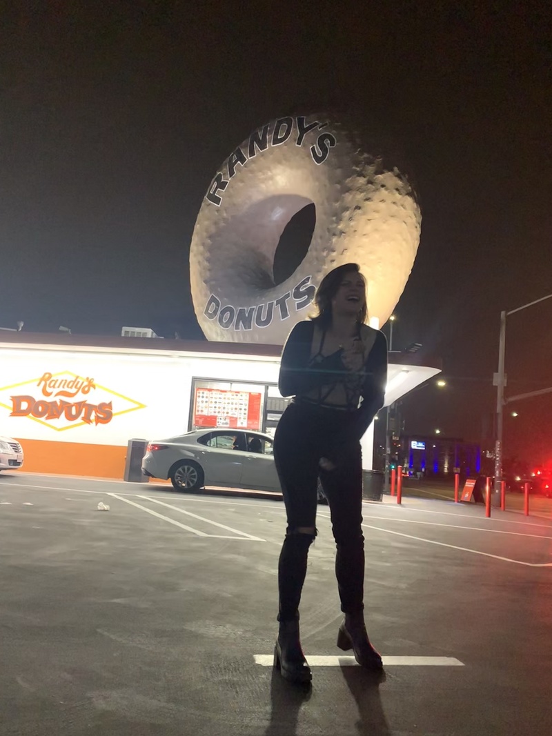 Female model photo shoot of Shellandlace in Randy's Donuts Inglewood, CA