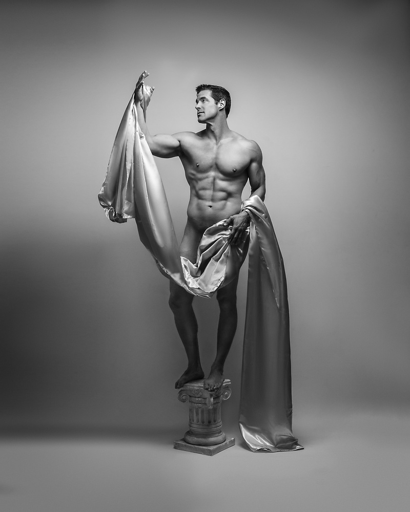 Male model photo shoot of PhotoDi_Retouch