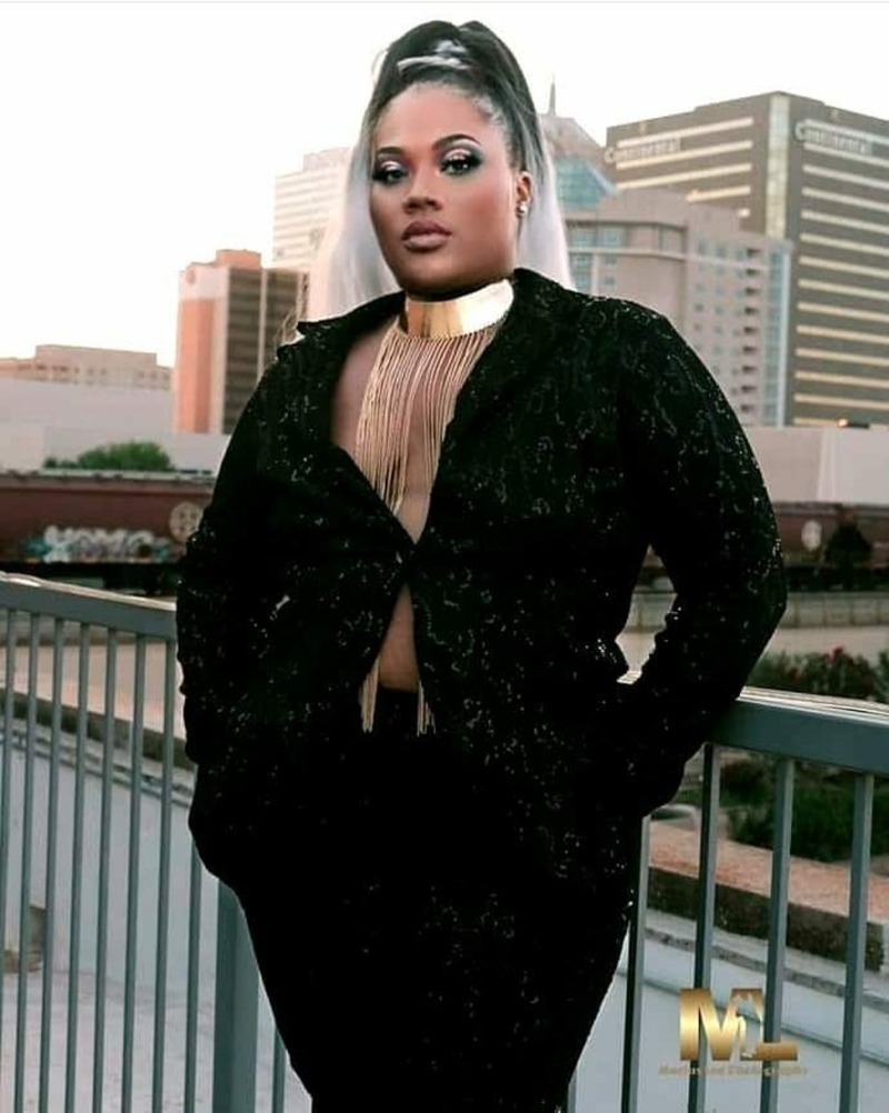 Female model photo shoot of Jshontai in downtown Oklahoma