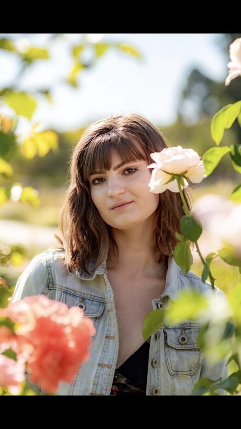 Female model photo shoot of Kesan in Rose Garden