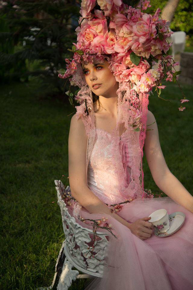 Female model photo shoot of Sarieka in Headdress by Melissa Sarieka