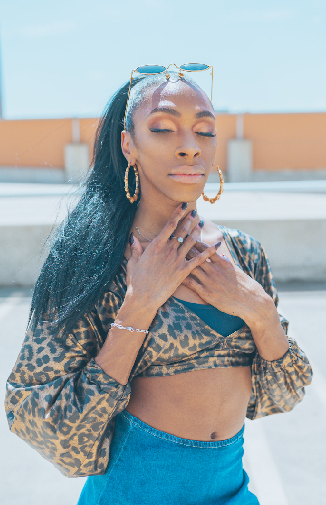 Female model photo shoot of Donyale Bartira in Downtown Austin, TX