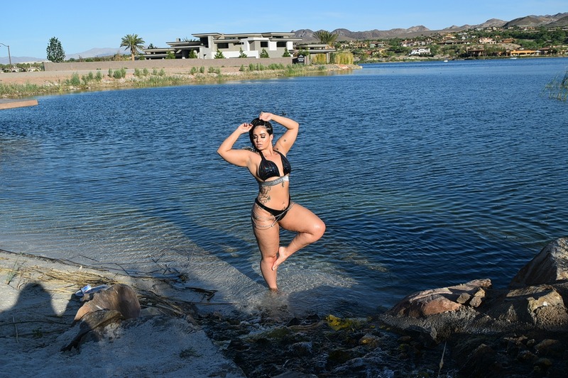 Female model photo shoot of Raylene Queen Royal in the lake