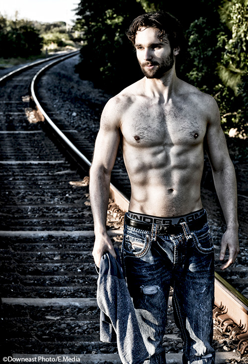 Male model photo shoot of Roman Fischer in railroad
