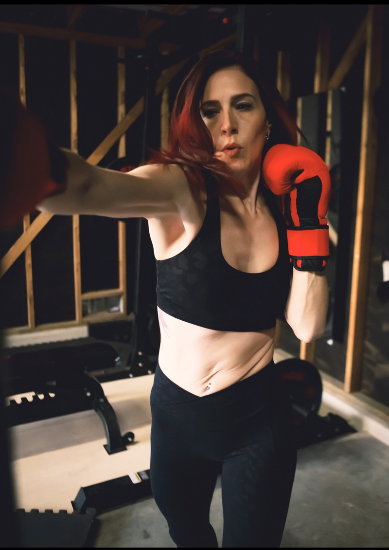 Female model photo shoot of ByeFeliza in Gym