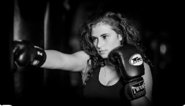 Female model photo shoot of RaeganModels in MMA Gym
