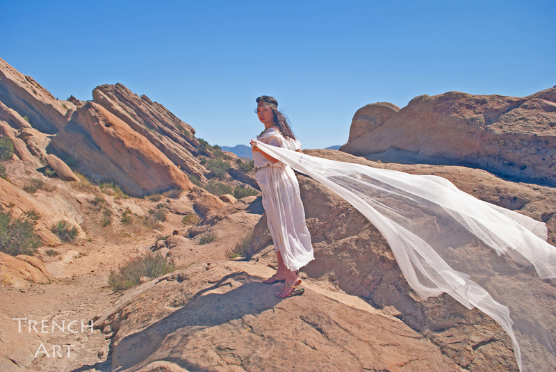 Male and Female model photo shoot of Trench Art and Mariela IV in Vasquez Rocks
