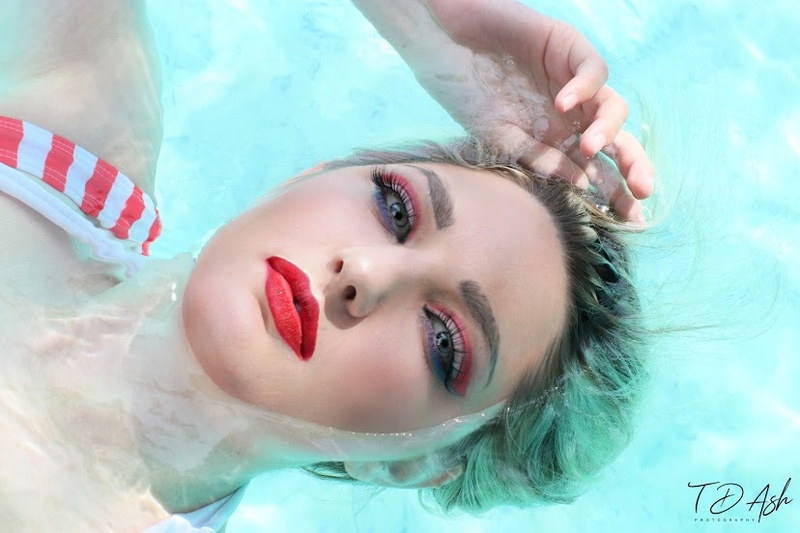 Female model photo shoot of Dolly_Doki in Pool