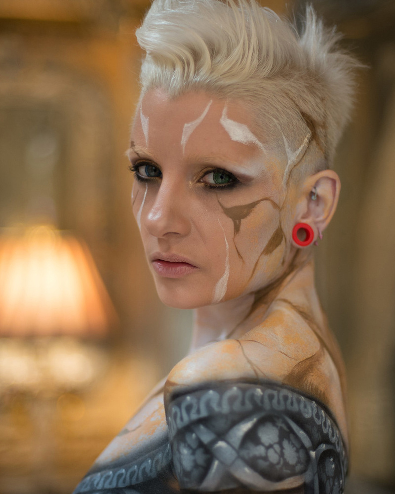 Female model photo shoot of Ulorin Vex, body painted by Roustan